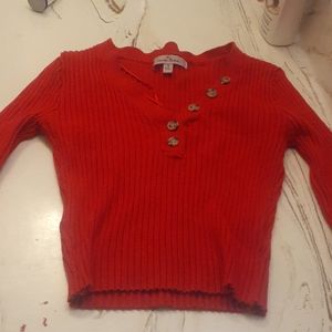 Red form fitting long sleeved button up shirt